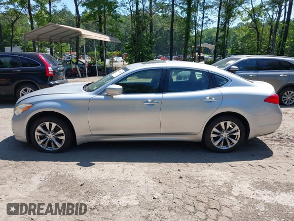 2012 Infiniti M with VIN JN1BY1AR4CM396809, listed as a IAAI auction lot 42394230 with 227,846 mi miles and . Bid and sale history available at DreamBid. Image 14.