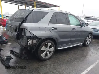 2018 Mercedes-Benz GLE 350 z VIN 4JGDA5JBXJB001718, wystawiony jako IAAI lot #41567368 z przebiegiem 81 487 mil mil oraz . Historia ofert i sprzedaży dostępna na DreamBid. Obrazek 4.