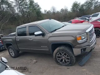 2015 GMC Sierra 1500 SLT with VIN 3GTU2VEC4FG366088, listed as a IAAI auction lot 41685051 with 111,768 mi miles and . Bid and sale history available at DreamBid. Image 13.
