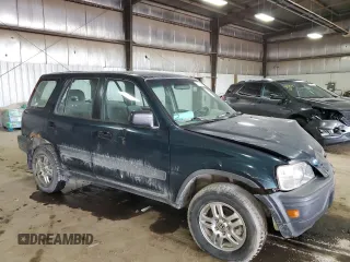 1997 Honda CR-V with VIN JHLRD184XVC032018, listed as a Copart auction lot 71179594 with 135,000 mi miles and Salvage Title. Bid and sale history available at carsss.com. Image 4.