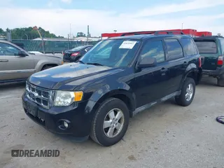 2011 Ford Escape XLT z VIN 1FMCU9D71BKA12061, wystawiony jako IAAI lot #42635447 z przebiegiem 195 433 mil mil oraz . Historia ofert i sprzedaży dostępna na DreamBid. Obrazek 2.