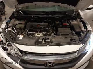 2018 Honda Civic EX with VIN 19XFC2F74JE005647, listed as a IAAI auction lot 41938607 with 90,263 mi miles and . Bid and sale history available at DreamBid. Image 10.