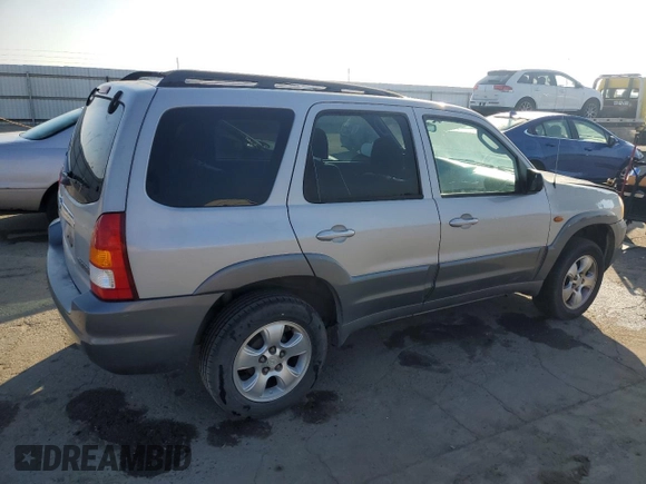 2002 Mazda Tribute LX with VIN 4F2YU09152KM50320, listed as a Copart auction lot 88131405 with 238,013 mi miles and Salvage Title. Bid and sale history available at carsss.com. Image 3.
