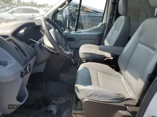 2016 Ford Transit Cargo z VIN 1FTYR2CM3GKB31134, wystawiony jako Copart lot #70293794 z przebiegiem 65 457 mil mil oraz Szkoda całkowita • Salvage title. Historia ofert i sprzedaży dostępna na DreamBid. Obrazek 7.
