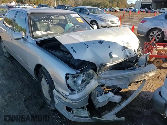 2000 Lexus LS 400 z VIN JT8BH28F6Y0173389, wystawiony jako Copart lot #42768585 z przebiegiem 143 535 mil mil oraz Szkoda całkowita • Salvage title. Historia ofert i sprzedaży dostępna na DreamBid. Obrazek 10.