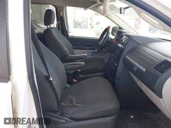 2008 Dodge Grand Caravan SE with VIN 1D8HN44H98B126418, listed as a IAAI auction lot 42223290 with 317,457 mi miles and . Bid and sale history available at DreamBid. Image 5.