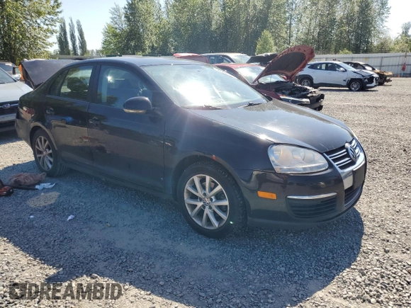 2010 Volkswagen Jetta S with VIN 3VWJZ7AJ1AM032185, listed as a Copart auction lot 58562615 with 189,752 mi miles and Salvage title. Bid and sale history available at DreamBid. Image 4.