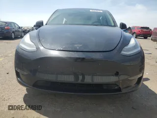 2023 Tesla Model Y Long Range z VIN 7SAYGDEE9PA115279, wystawiony jako Copart lot #55018275 z przebiegiem 43 026 mil mil oraz Szkoda całkowita • Salvage title. Historia ofert i sprzedaży dostępna na DreamBid. Obrazek 5.