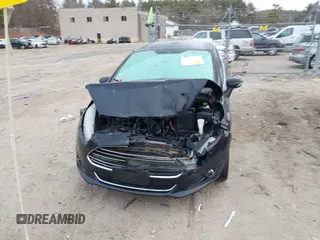 2017 Ford Fiesta Titanium with VIN 3FADP4FJ6HM112434, listed as a IAAI auction lot 41803424 with Not Provided miles and . Bid and sale history available at DreamBid. Image 12.