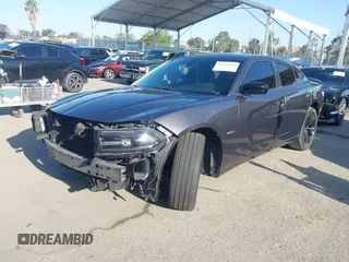 2017 Dodge Charger R/T with VIN 2C3CDXCT9HH557212, listed as a IAAI auction lot 41966838 with 98,717 mi miles and . Bid and sale history available at DreamBid. Image 2.