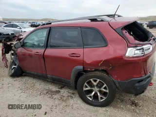 2014 Jeep Cherokee Trailhawk with VIN 1C4PJMBS6EW310871, listed as a Copart auction lot 49439665 with 0 mi miles and Salvage Title. Bid and sale history available at carsss.com. Image 2.