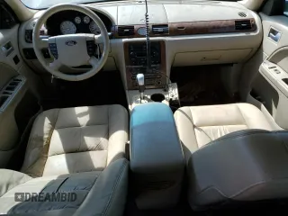 2005 Ford Five Hundred Limited with VIN 1FAFP28135G201703, listed as a Copart auction lot 74421714 with 114,247 mi miles and Salvage Title. Bid and sale history available at carsss.com. Image 8.