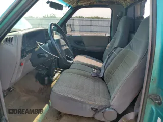 1994 Ford Ranger Splash with VIN 1FTCR10A4RPA84328, listed as a Copart auction lot 59205525 with 390,494 mi miles and Salvage title. Bid and sale history available at DreamBid. Image 7.