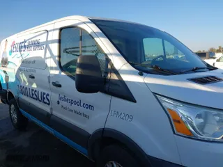 2016 Ford Transit Cargo Van with VIN 1FTYR1ZM8GKA39180, listed as a IAAI auction lot 41245425 with 115,018 mi miles. Bid and sale history available at carsss.com. Image 13.