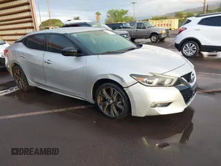 2016 Nissan Maxima S z VIN 1N4AA6AP1GC411633, wystawiony jako IAAI lot #41559508 z przebiegiem 95 240 mil mil oraz . Historia ofert i sprzedaży dostępna na DreamBid. Obrazek 1.