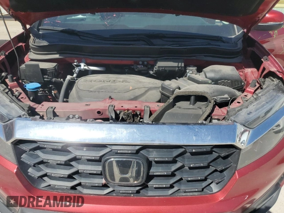 2023 Honda Passport EX-L with VIN 5FNYF8H57PB007264, listed as a Copart auction lot 48942955 with 18,013 mi miles and Salvage Title. Bid and sale history available at DreamBid. Image 12.