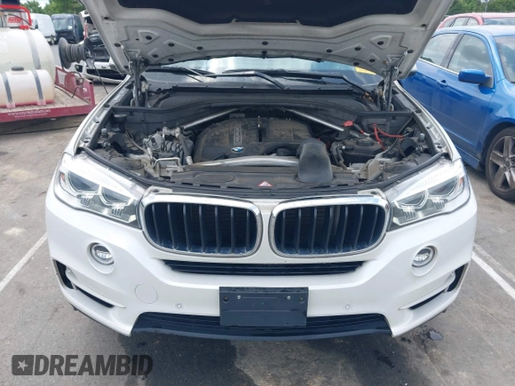 2014 BMW X5 sDrive35i z VIN 5UXKR2C54E0H34800, wystawiony jako IAAI lot #42110978 z przebiegiem 106 891 mil mil oraz . Historia ofert i sprzedaży dostępna na DreamBid. Obrazek 10.
