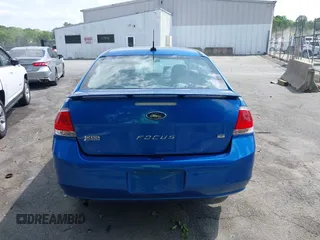 2010 Ford Focus SE z VIN 1FAHP3FNXAW168235, wystawiony jako IAAI lot #42091111 z przebiegiem 64 198 mil mil oraz . Historia ofert i sprzedaży dostępna na DreamBid. Obrazek 16.