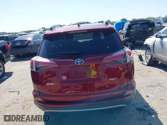 2018 Toyota RAV4 XLE with VIN 2T3WFREV8JW425464, listed as a IAAI auction lot 41977877 with 142,265 mi miles and . Bid and sale history available at carsss.com. Image 16.