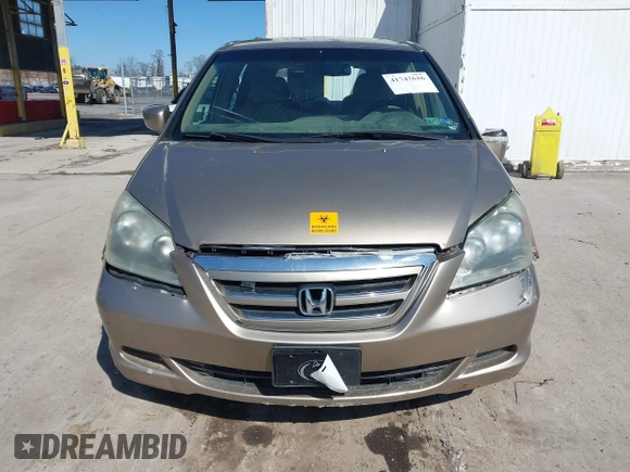 2006 Honda Odyssey EX z VIN 5FNRL384X6B459148, wystawiony jako IAAI lot #41747616 z przebiegiem 158 995 mil mil oraz . Historia ofert i sprzedaży dostępna na DreamBid. Obrazek 6.