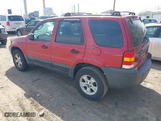 2006 Ford Escape XLT with VIN 1FMYU03186KA06262, listed as a IAAI auction lot 41912605 with 157,117 mi miles. Bid and sale history available at carsss.com. Image 3.