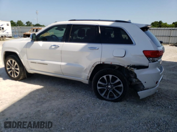 2018 Jeep Grand Cherokee Overland z VIN 1C4RJFCG4JC425589, wystawiony jako Copart lot #61775775 z przebiegiem 102 040 mil mil oraz Szkoda całkowita • Salvage title. Historia ofert i sprzedaży dostępna na DreamBid. Obrazek 2.