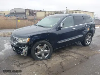 2012 Jeep Grand Cherokee Overland with VIN 1C4RJFCT9CC182216, listed as a IAAI auction lot 41490446 with 153,237 mi miles. Bid and sale history available at carsss.com. Image 17.