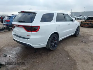 2018 Dodge Durango SRT with VIN 1C4SDJGJ4JC341550, listed as a IAAI auction lot 41525295 with 86,503 mi miles and . Bid and sale history available at DreamBid. Image 4.