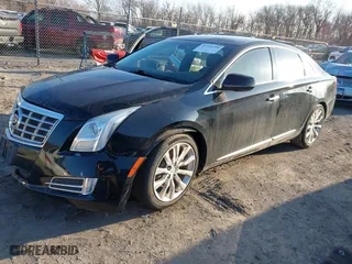 2015 Cadillac XTS Luxury with VIN 2G61N5S34F9226182, listed as a IAAI auction lot 41554394 with 119,194 mi miles. Bid and sale history available at carsss.com. Image 16.
