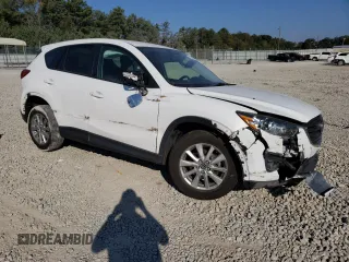 2016 Mazda CX-5 Touring with VIN JM3KE2CY6G0896040, listed as a Copart auction lot 78399684 with 98,639 mi miles and Salvage Title. Bid and sale history available at DreamBid. Image 4.