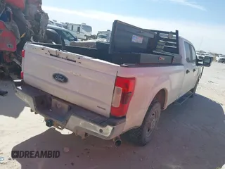 2019 Ford Super Duty F-250 SRW XL with VIN 1FT7W2A69KEC68823, listed as a IAAI auction lot 41689175 with 153,022 mi miles. Bid and sale history available at carsss.com. Image 4.