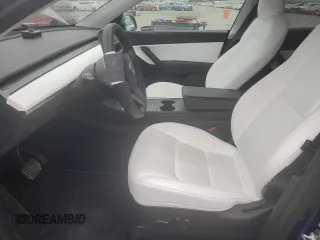 2022 Tesla Model Y Long Range z VIN 7SAYGDEE6NF429651, wystawiony jako Copart lot #57172355 z przebiegiem 19 499 mil mil oraz Szkoda całkowita • Salvage title. Historia ofert i sprzedaży dostępna na DreamBid. Obrazek 7.