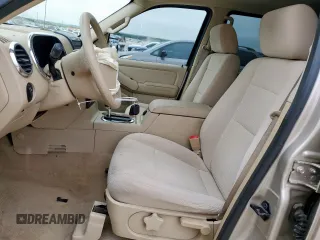 2006 Ford Explorer XLS with VIN 1FMEU62E06UA49198, listed as a Copart auction lot 59551545 with 68,883 mi miles and Salvage title. Bid and sale history available at DreamBid. Image 7.