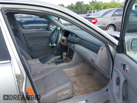 2002 Mazda Millenia with VIN JM1TA221721722364, listed as a IAAI auction lot 42160683 with 166,778 mi miles and . Bid and sale history available at DreamBid. Image 5.