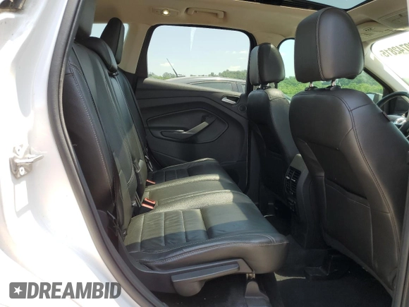 2016 Ford Escape Titanium with VIN 1FMCU9J96GUA48071, listed as a Copart auction lot 60742815 with 193,100 mi miles and Salvage title. Bid and sale history available at DreamBid. Image 11.