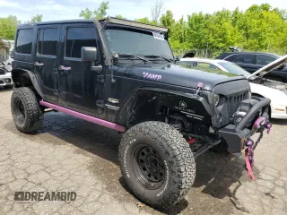 2012 Jeep Wrangler Unlimited Sahara with VIN 1C4BJWEG4CL120370, listed as a Copart auction lot 58744135 with 166,455 mi miles and Clean title. Bid and sale history available at DreamBid. Image 4.