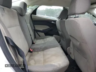 2013 Ford Focus SE z VIN 1FADP3F24DL217259, wystawiony jako Copart lot #51573535 z przebiegiem Nie podano mil oraz Szkoda całkowita • Salvage title. Historia ofert i sprzedaży dostępna na DreamBid. Obrazek 10.