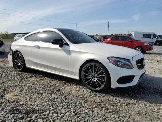 2018 Mercedes-Benz C 300 with VIN WDDWJ4JB7JF736453, listed as a Copart auction lot 50790205 with 67,575 mi miles and Salvage Title. Bid and sale history available at carsss.com. Image 4.