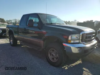 2003 Ford Super Duty F-250 XL with VIN 1FTNX21S03EB08722, listed as a Copart auction lot 75127904 with 95,623 mi miles and Salvage Title. Bid and sale history available at carsss.com. Image 4.