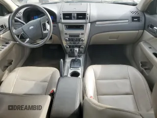 2012 Ford Fusion Hybrid z VIN 3FADP0L33CR211609, wystawiony jako Copart lot #60873005 z przebiegiem 144 474 mil mil oraz Szkoda całkowita • Salvage title. Historia ofert i sprzedaży dostępna na DreamBid. Obrazek 8.