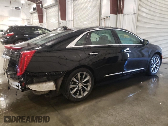 2014 Cadillac XTS Luxury with VIN 2G61N5S33E9246454, listed as a Copart auction lot 63100655 with 110,544 mi miles and Salvage title. Bid and sale history available at DreamBid. Image 3.