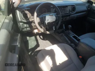 2021 Toyota Tacoma SR with VIN 3TYRX5GN9MT024483, listed as a Copart auction lot 55847115 with 22,523 mi miles and Salvage title. Bid and sale history available at DreamBid. Image 8.