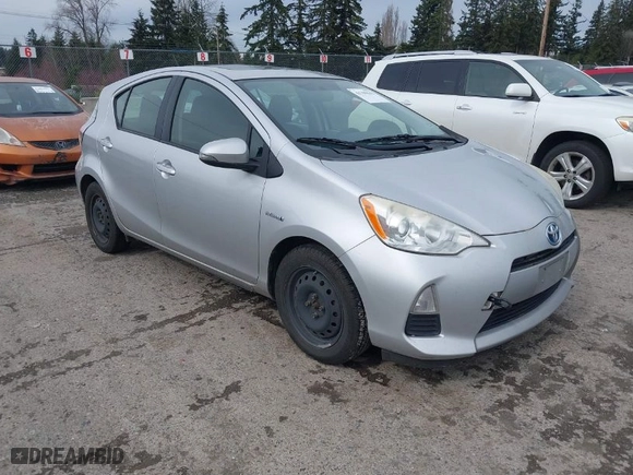 2013 Toyota Prius c One with VIN JTDKDTB32D1035449, listed as a IAAI auction lot 41799633 with 132,518 mi miles. Bid and sale history available at carsss.com. Image 1.