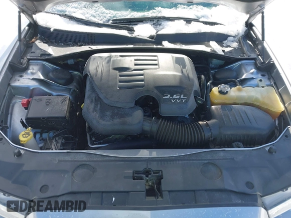 2014 Dodge Charger SXT with VIN 2C3CDXJG2EH135638, listed as a IAAI auction lot 41557427 with 83,536 mi miles. Bid and sale history available at carsss.com. Image 10.