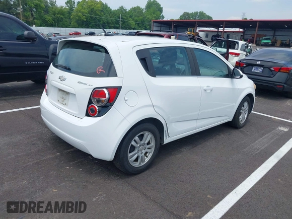 2012 Chevrolet Sonic LT z VIN 1G1JD6SH6C4232414, wystawiony jako IAAI lot #42489990 z przebiegiem 174 731 mil mil oraz . Historia ofert i sprzedaży dostępna na DreamBid. Obrazek 4.