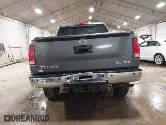 2014 Nissan Titan S with VIN 1N6AA0EC6EN513801, listed as a IAAI auction lot 41762295 with 128,412 mi miles and . Bid and sale history available at DreamBid. Image 16.