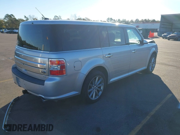 2013 Ford Flex Limited with VIN 2FMHK6D83DBD02351, listed as a IAAI auction lot 40977231 with 194,651 mi miles. Bid and sale history available at carsss.com. Image 4.