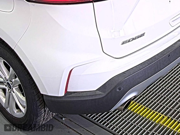 2019 Ford Edge SEL with VIN 2FMPK3J9XKBC37759, listed as a IAAI auction lot 42666643 with 103,812 mi miles and . Bid and sale history available at DreamBid. Image 8.