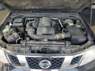 2014 Nissan Frontier SV with VIN 1N6AD0EV9EN710020, listed as a Copart auction lot 60895575 with 125,090 mi miles and Salvage title. Bid and sale history available at DreamBid. Image 11.
