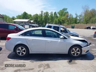 2014 Chevrolet Cruze 1LT with VIN 1G1PC5SB4E7354774, listed as a IAAI auction lot 42104388 with 136,532 mi miles and . Bid and sale history available at DreamBid. Image 12.